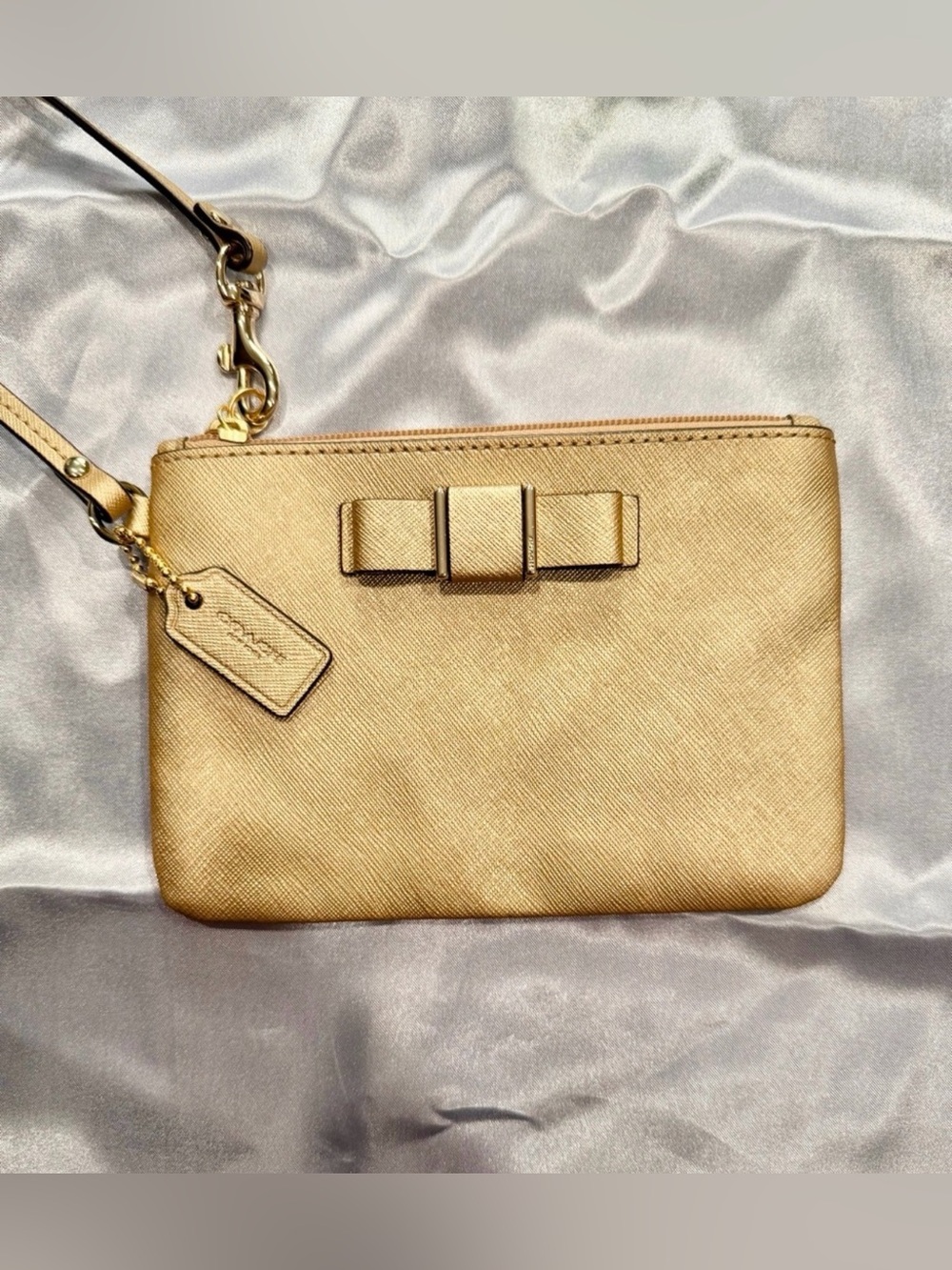 Coach Metallic Gold Bow Wristlet Clutch